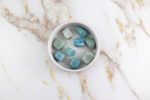 Aquamarine rolled stone - Cliks and shopCliks and shopCliks and shopAquamarine rolled stoneSolstice et Mineraux